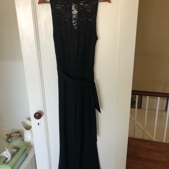 Black romper, Eclipse size M, fits size 8-10. Hand wash, 100% polyester - Picture 8 of 11